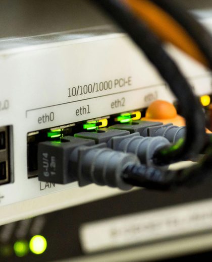 Hardware interface and connector layout on an industrial enclosure.